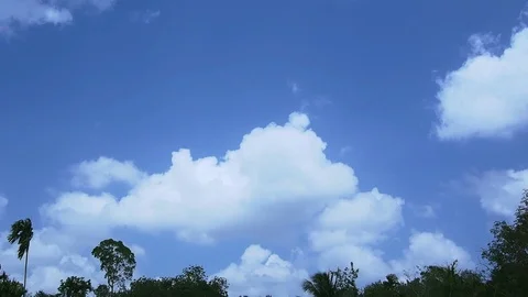 Slowly passing cloud with vivid blue sky Stock Footage 126467910