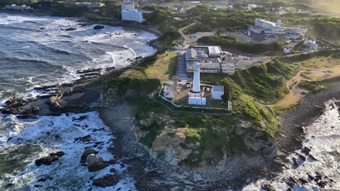 Slowly Pulling Back from Inubosaki Lighthouse, Choshi Coast Stock Footage 342264039