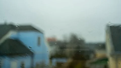 Slowly rain dripping on skylight Stock Footage 121739802