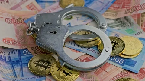 Slowly roataing background of russian ruble banknotes scattered with bitcoin Stock Footage 174921871