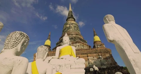 Slowly rotating around some statues at a temple in Thailand Stock Footage 72393330