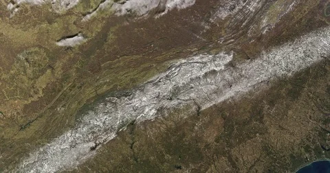 Slowly rotating zoom out from snow across the southeastern US, 2017 Video stock 85292017