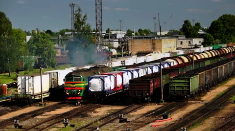 Slowly sailing freight train. Shot feom above Stock Footage 57747583