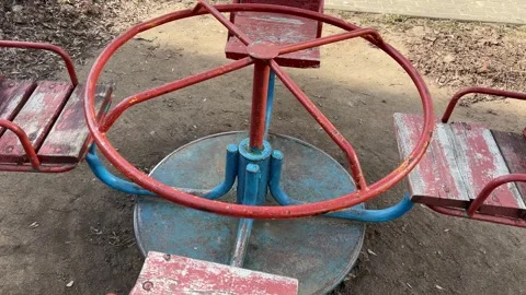 Slowly Spinning Carousel: Empty Seats in Motion Stock Footage 270161094