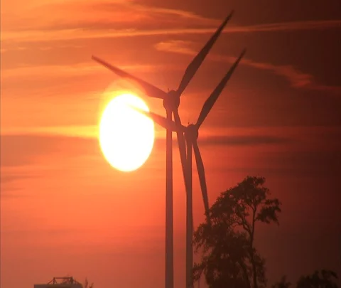Slowly turning wind turbines in late afternoon sun Stock-Footage 86743268