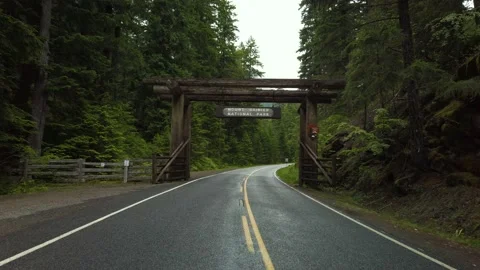 Slowly Walking towards Mount Rainier National Park Entrance in Washington Stock Footage 135136264