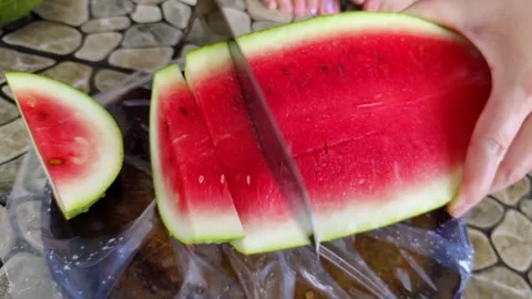 Slowmo close-up scene of a cut watermelon Stock Footage 304313507