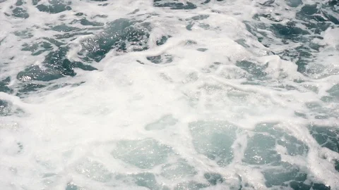 Slowmo Close Up White Foam Waves in Ocean Seen From Moving Boat Stock Footage 126086482