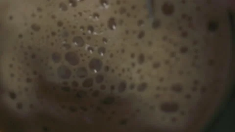 Slowmo coffee foaming (25p) Stock Footage 137292309