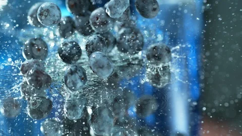 Slowmo Fresh Blueberries Falling &amp; Splashing Into Clean Fresh Water Stock Footage 113191581
