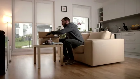 Slowmo Getting Ready To Use Supplies From The Pandemic COVID-19 Cardboard Box Stock Footage 142862545