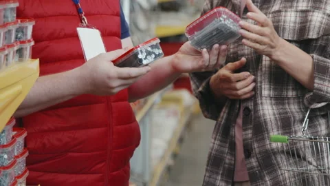 Slowmo of Hardware Store Employee Helping Customer Stock-Footage 158049527