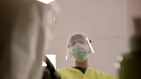 Slowmo: Packing a Parcel With COVID-19 Protection Items in Fulfilment Center Stock Footage 142862740