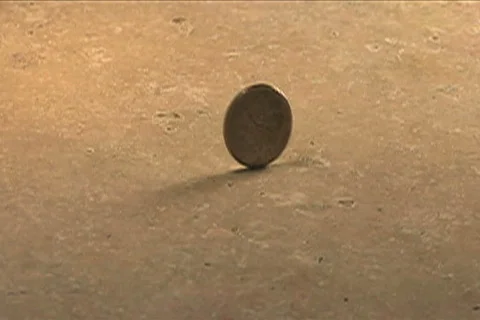 SlowMo Spinning Coin Video stock 140601