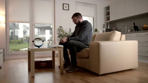 Slowmo: Taking Off Protective Gloves After Unpacking A Pandemic Package At Home Stock-Footage 142863620