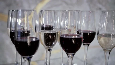 Slowmo video of  table decoration. Close-up of glasses of wine and champagne Stock Footage 231236615