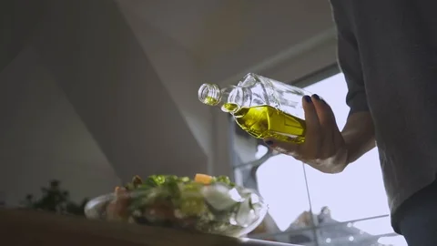 Slowmotion Adding Oil In The Kitchen Stock Footage 113232330