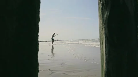 Slowmotion Beach Boarder doing long Slide Stock Footage 58005221