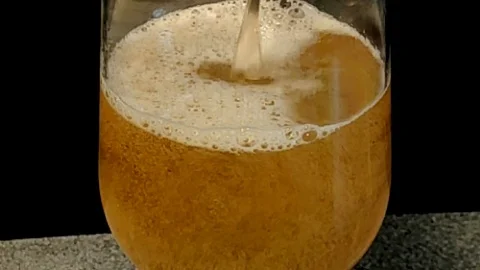 Slowmotion beer in a glass Stock Footage 123418896