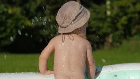 Slowmotion Child Pool Stock Footage 283907730