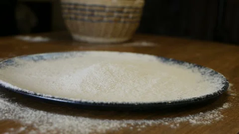 Slowmotion. Close-up of flour through a sieve fray. Sifting flour. Baking Stock Footage 105046637