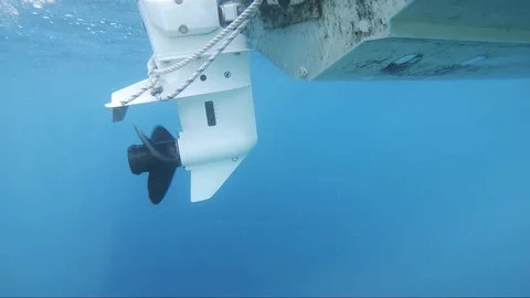 Slowmotion close up shot of boat propeller starts with nice air bubbles Video stock 100461459