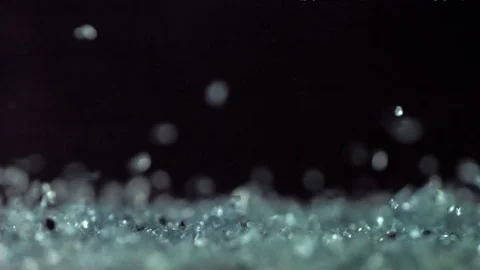Slowmotion cristalls bouncing in highspeed Stock Footage 84894905