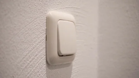 Slowmotion Disinfecting Light Switch Stock Footage 128155062