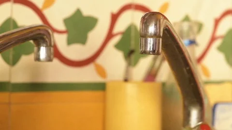 Slowmotion of dripping  tap Stock Footage 102942087