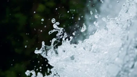 Slowmotion Droplets Flowing From Waterfall Stock Footage 135544388