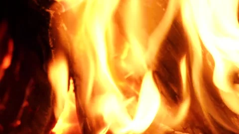Slowmotion. Fire. Red fire. Fireplace. Tongues of flame. Screensaver on phone/TV Stock Footage 130588981