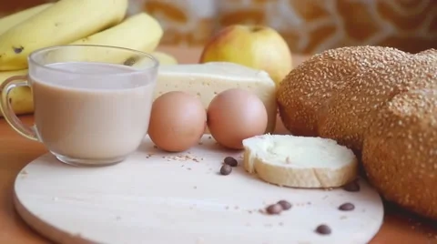 Slowmotion. Healthy breakfast on the table close up with cup of coffee Stock Footage 49956997