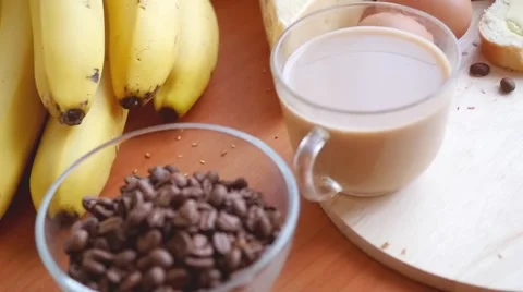 Slowmotion. Healthy breakfast on the table close up with cup of coffee Stock Footage 49957029
