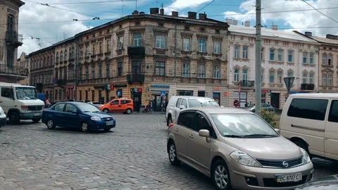 Slowmotion: High traffic at the intersection in Lviv, mess and chaos on Stock Footage 118060543