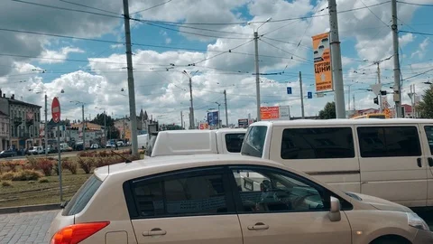 Slowmotion: High traffic at the intersection in Lviv, mess and chaos on Stock Footage 118060550
