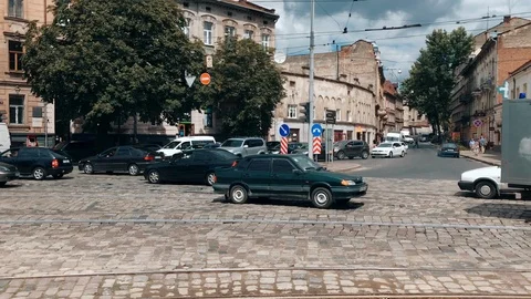 Slowmotion: High traffic at the intersection in Lviv, mess and chaos on Stock Footage 118060553