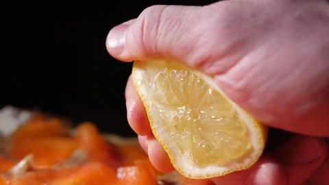 Slowmotion of a lemon being squeezed Stock Footage 251847298