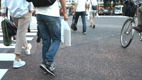 Slowmotion - People walking on the crosswalk Stock Footage 88992807