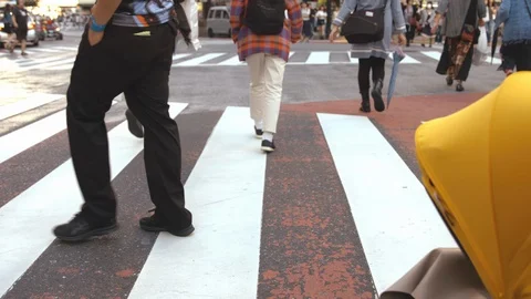 Slowmotion - People walking on the crosswalk Stock Footage 88993529