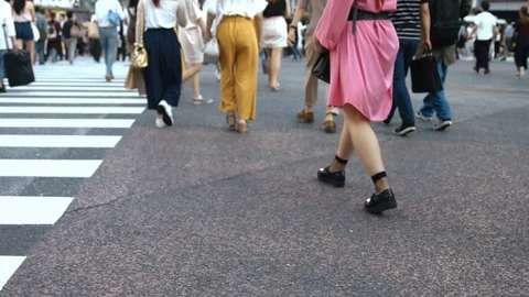Slowmotion - People walking on the crosswalk Stock Footage 88995308