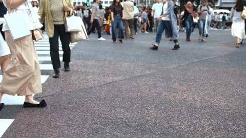 Slowmotion - People walking on the crosswalk Stock Footage 88997653