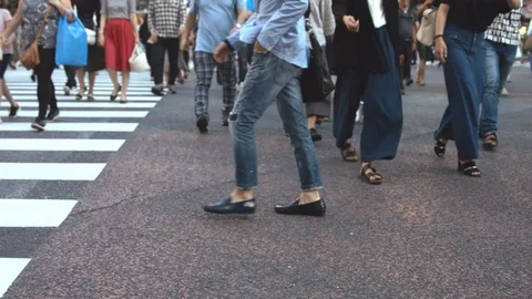 Slowmotion - People walking on the crosswalk Stock Footage 88997910