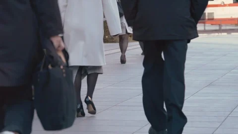 Slowmotion - People walking on sidewalk ( Foot video Tokyo station at winter ) Stock Footage 88976289