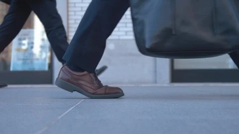 Slowmotion - People walking on sidewalk ( Foot video Tokyo station at winter ) Stock Footage 88979953