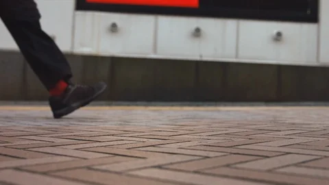 Slowmotion - People walking on the sidewalk Stock Footage 89005019