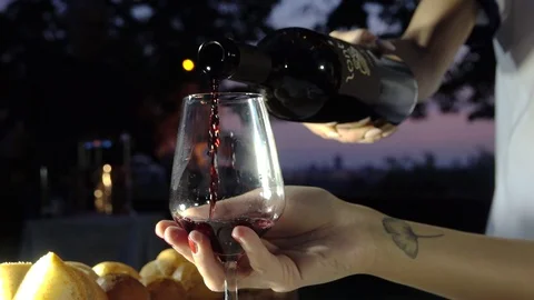 Slowmotion pouring red wine Stock Footage 128011921