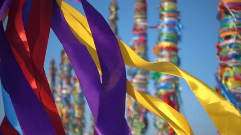 Slowmotion ritual ribbons fluttering in wind on pillars Lake Baikal landmark 4k Stock Footage 165217320