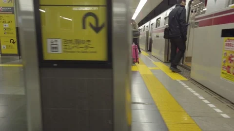 Slowmotion view inside the subway train while walking out from the train comm Stock Footage 221880405