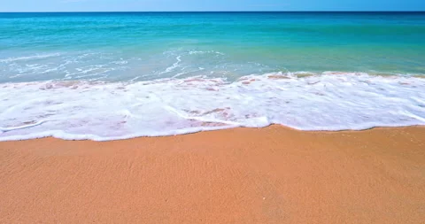 Slowmotion wave crash on sand beach. Vacation paradise nature background Stock Footage 168820028