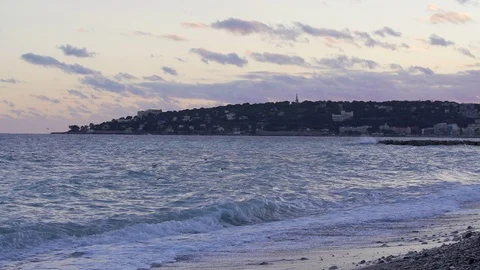 Slowmotion of waves breaking on the pebble beach, Mentone, French Riviera Stock Footage 120727508